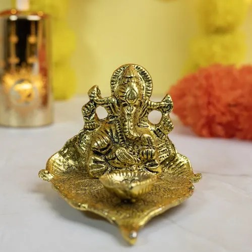 Stunning Lord Ganesha with Diya