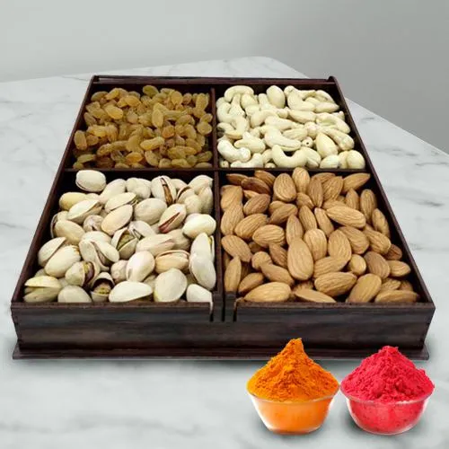 Nice Wrapped Gift Box containing  Mixed Dry Fruits i.e. Raisin, Pistas, Cashews, Almonds, Wallnuts with free Gulal/Abir Pouch. 
