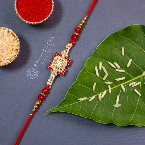 Charming Jewelled Swastik Rakhi