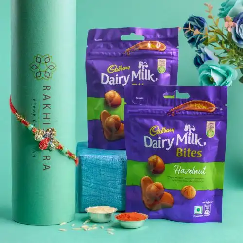 Charming Peacock Rakhi N Cadbury Hazelnut Bites Combo