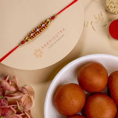 Beautiful AD Rakhi N Gulab Jamun Combo