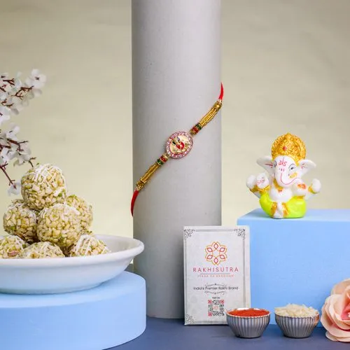 Auspicious Ganesha Rakhi N Sweets Combo