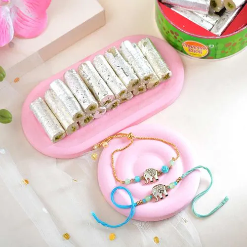 Fancy Rakhi Set with Pista Rolls Indulgence